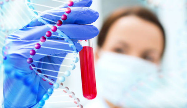 science, chemistry, biology, medicine and people concept - close up of young female scientist holding test tube with blood sample making research in clinical laboratory over dna molecule structure